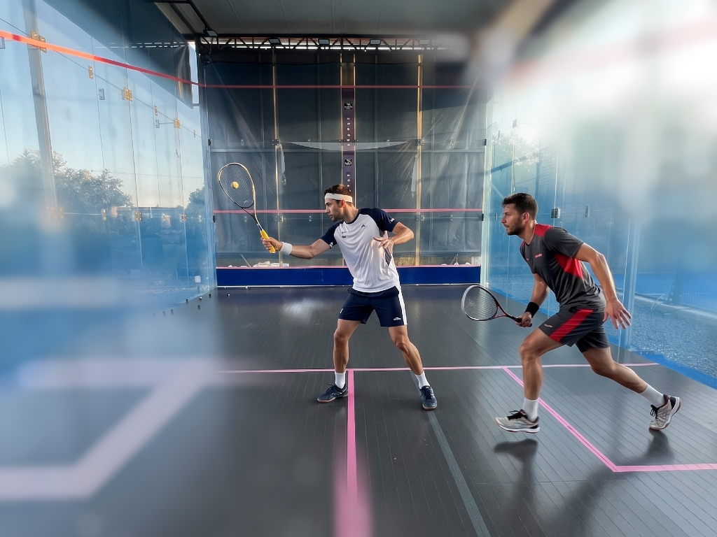 Padel players in action